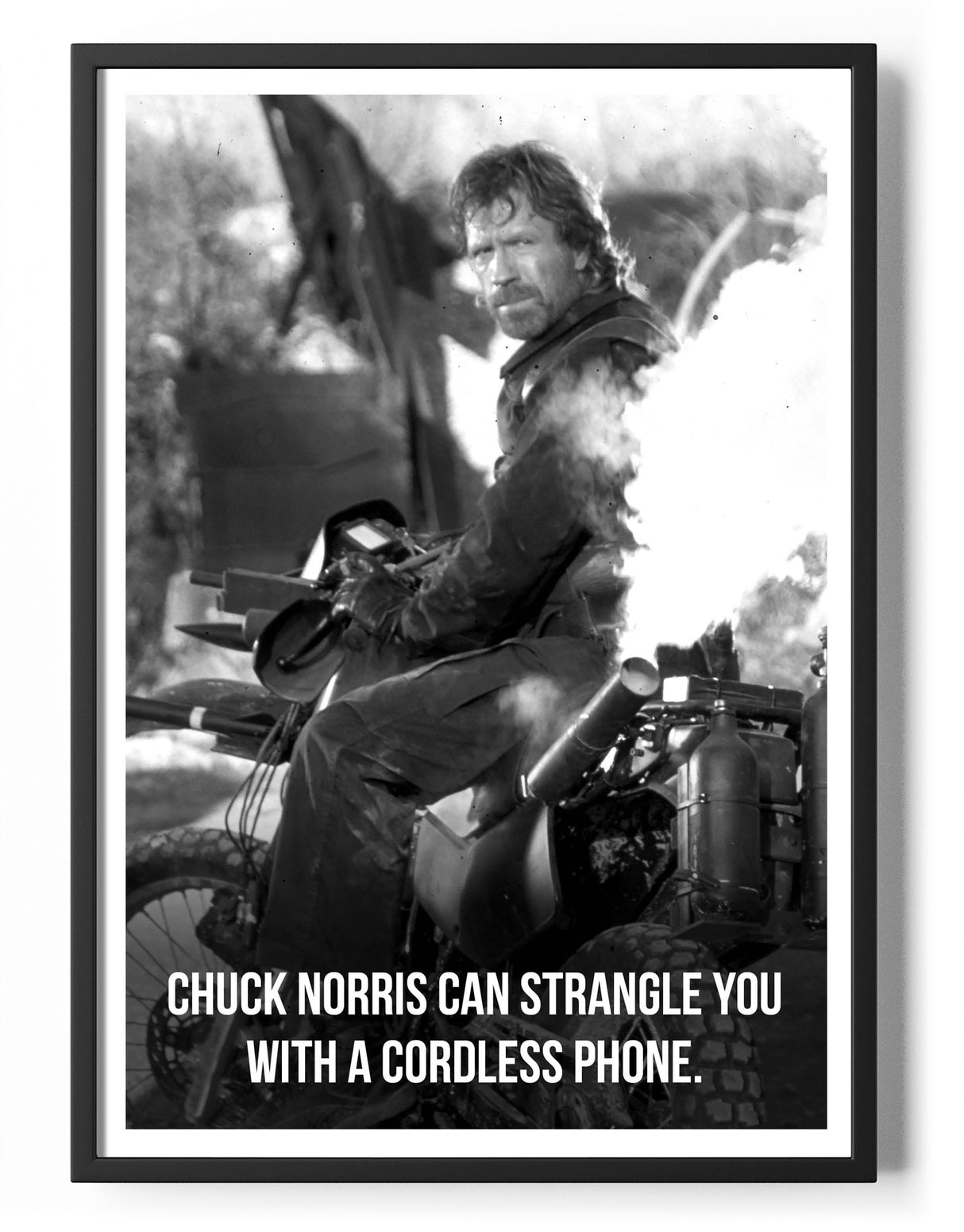 Chuck Norris Can Strangle You With A Cordless Phone Poster